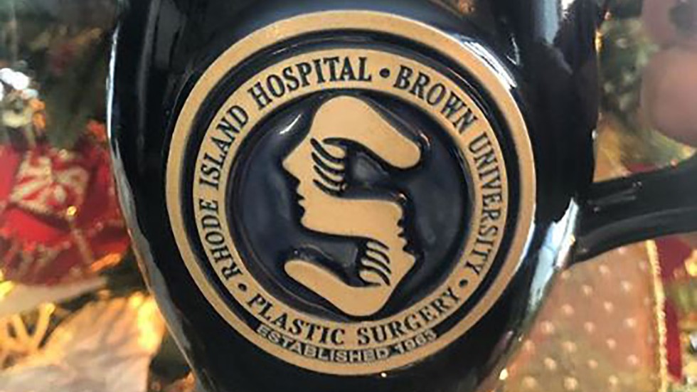 plastic surgery logo on a coffee mug